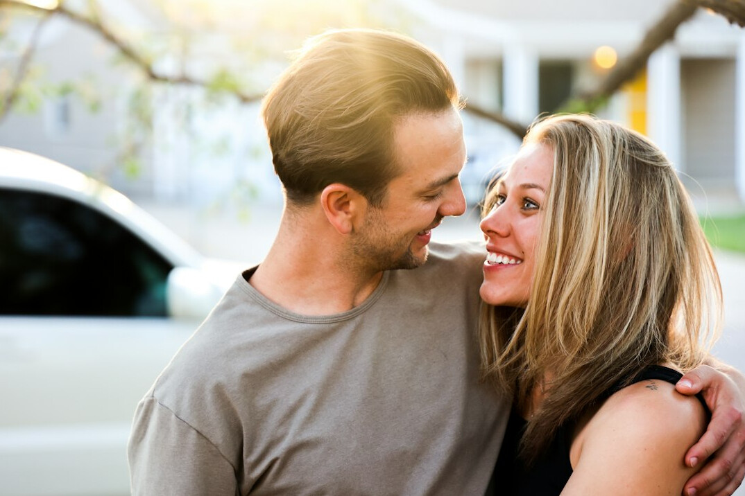 happy couple embracing after talk
