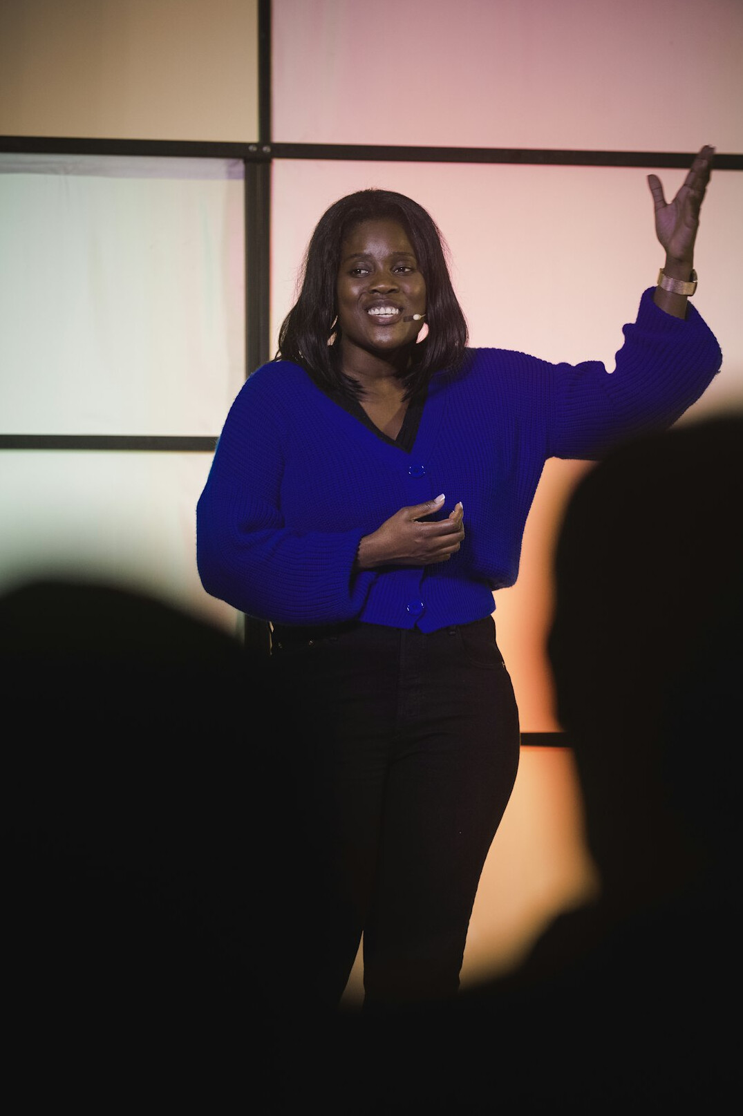 person giving speech at conference