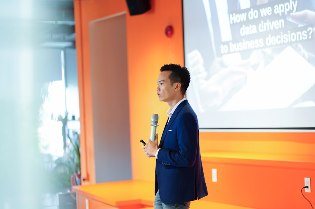confident speaker on stage